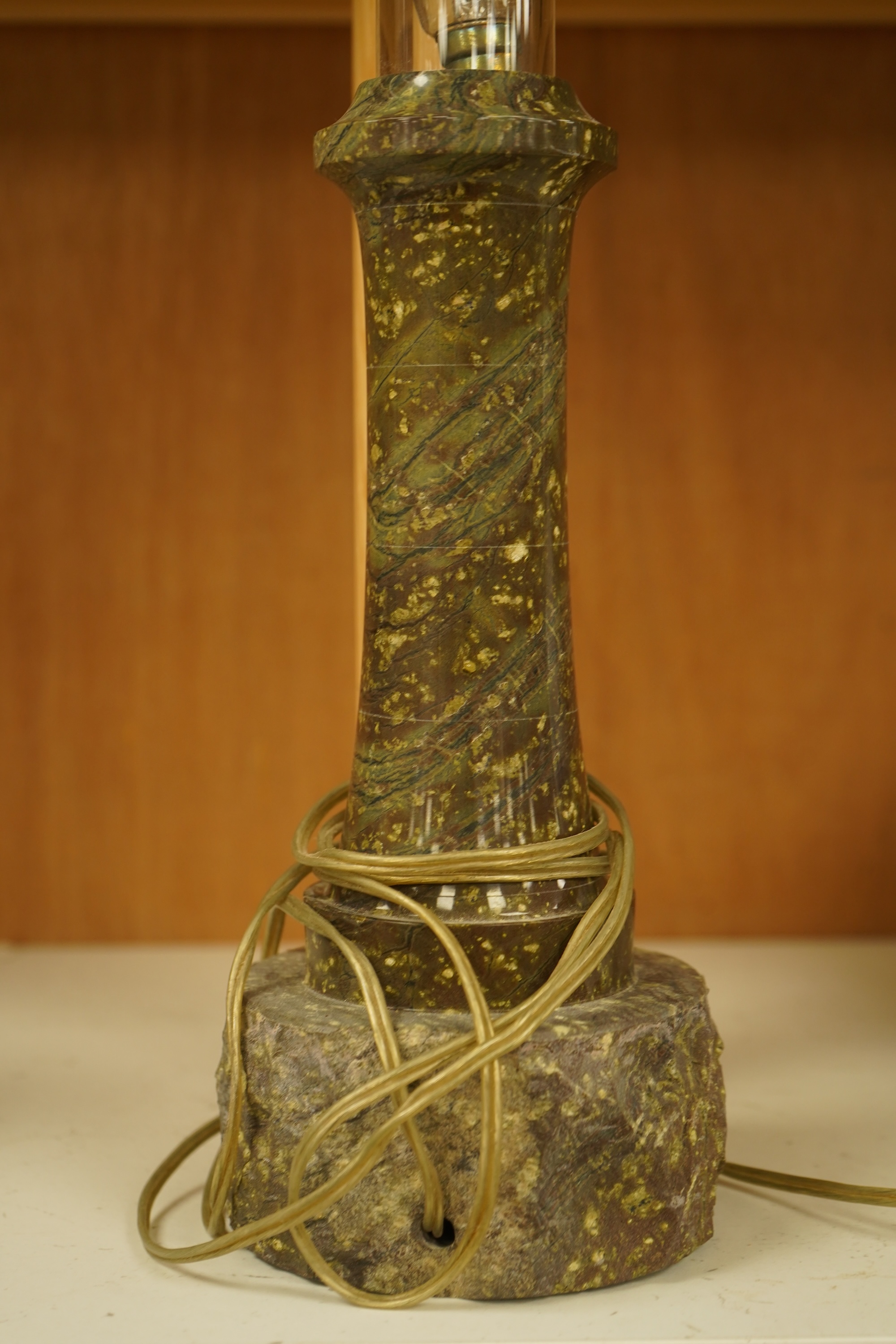 A Cornish serpentine lighthouse table lamp, 33cm high